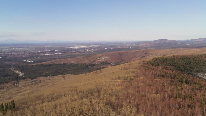 Wide Aerial View of Hillside with Fairbanks Alaska, and the Alaska Range beyond
