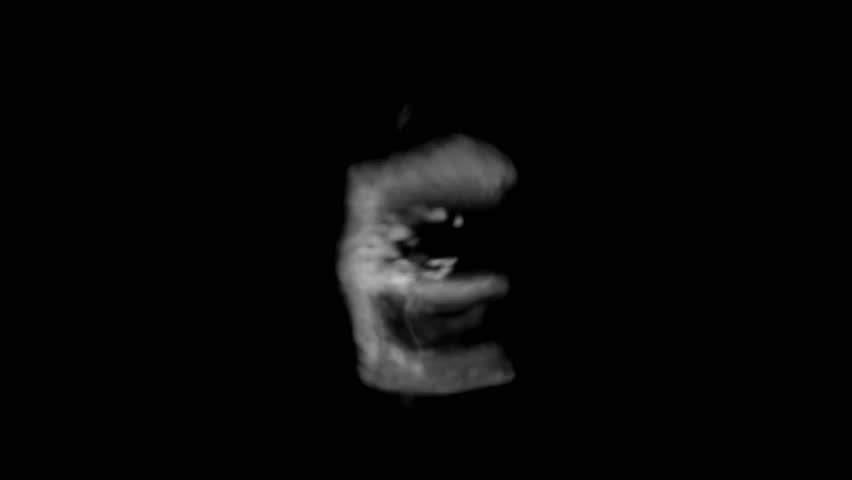 Mesmerizing smoke animation forming the alphabet letter E on a black screen. Elegant motion graphics showcasing swirling vapor with a modern and artistic touch
