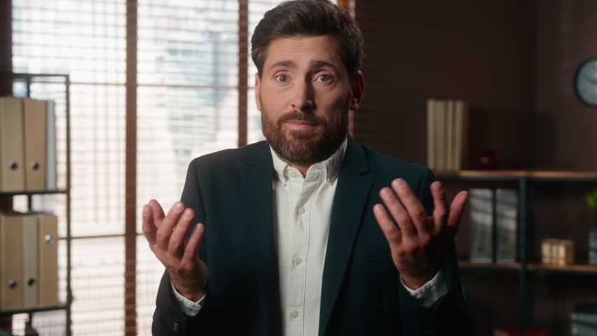 Portrait at office confused uncertain Caucasian man business male company worker problem trouble bad businessman guy looking at camera spread hands shrug shoulder unsure hesitate shrugging ignorance