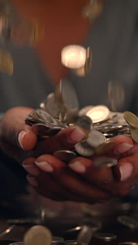 Hands Filled with Coins Exploring the True Value and Importance of Money and Currency