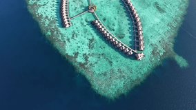 Aerial views of Gaafu Dhaalu Atoll Maguhdhuvaa Island, Maldives - Powered by Shutterstock - Get 15% off with code: PIKWIZARD15