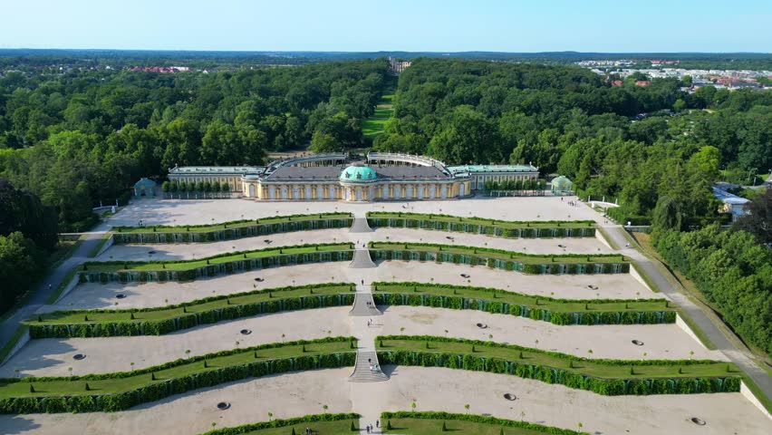 Sunny summer day Potsdam sanssouci Palace showing the beautiful green gardens and surrounding area. Dramatic aerial view flight panorama overview drone