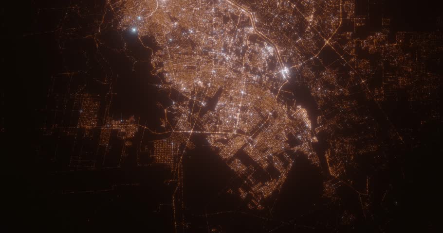 Ciudad Juarez (Mexico) aerial view at night. Satellite view on modern city with street lights. Camera is flying above the city, moving forward