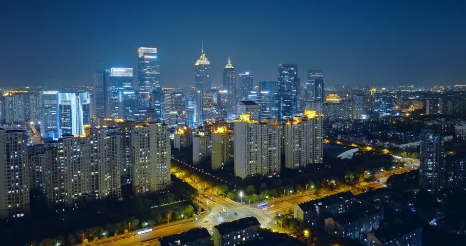Aerial view of modern urban commercial buildings and skyline at night in Suzhou, China