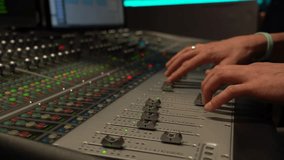 Hands on Audio Mixing Console at Professional Recording Studio - Powered by Shutterstock - Get 15% off with code: PIKWIZARD15