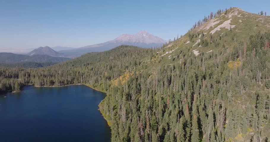 Aerial panoramic tracking left establishes Castle Lake in Shasta California USA