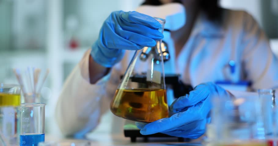 Laboratory experiment demonstrating chemical reactions and oil analysis. Quality control of oil and petroleum products