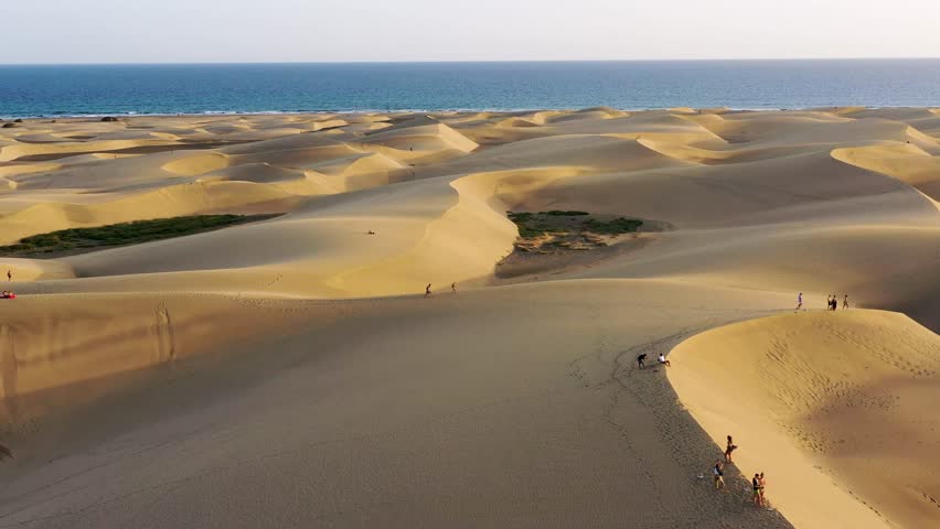 Landscape with Maspalomas town and golden sand dunes, Gran Canaria, Canary Islands, Spain. Natural Reserve of Dunes of Maspalomas, in Gran Canaria, Canary Islands, Spain.