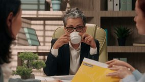 Diverse businesswomen women briefing business workers conference females director boss drink coffee documents team discuss project colleagues coworkers office paperwork planning meeting data company - Powered by Shutterstock - Get 15% off with code: PIKWIZARD15