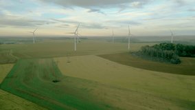 Wind generator.  Wind farm.Alternative energy in the European Union. Renewable energy saves the planet's ecology. - Powered by Shutterstock - Get 15% off with code: PIKWIZARD15