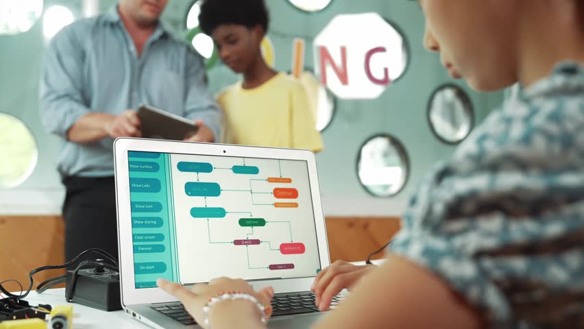 high school girl writing prompt while boy looking at teacher tablet. Cute academic student learning about coding and programming system. while happy teacher giving advice and comment pupil