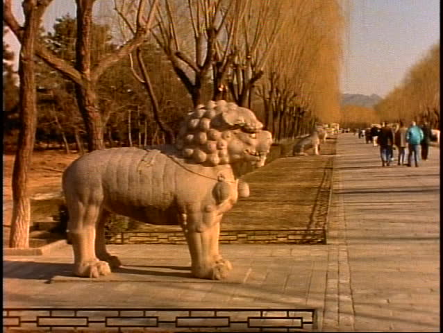 CHINA, 1999, Ming Tomb walkway statues medium shot, lion