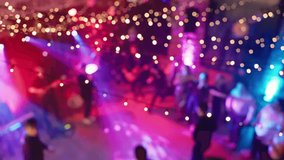 A Defocused Party Scene Filled with Colorful Lights, Creating an Energetic and Lively Atmosphere Around - Powered by Shutterstock - Get 15% off with code: PIKWIZARD15