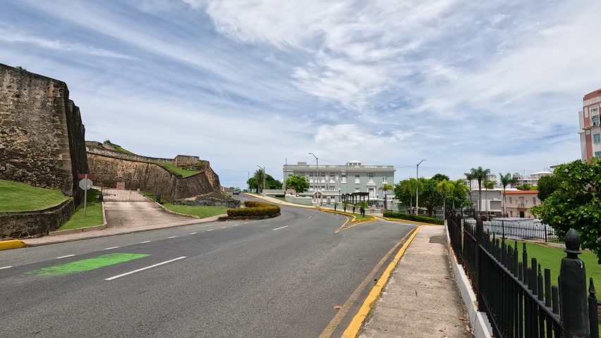 Castillo san cristobal, historical fort, stands guard over old san juan, puerto rico, under cloudy sky, showcasing the city