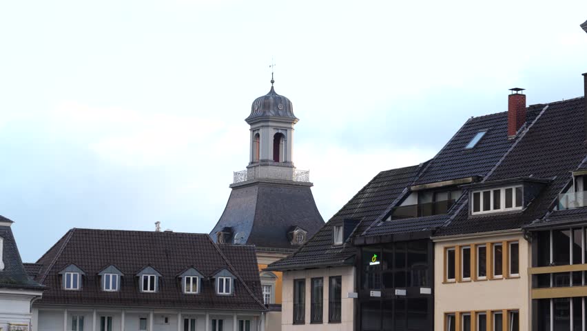 Market square in front of the old city hall of Bonn, Germany. Christmas and New Year period. There is a Christmas tree on the square. 
