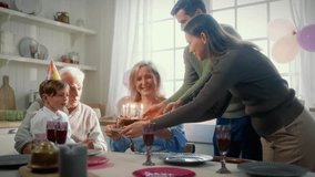 Family values and tradition, celebrating birthday of child with cake and candles . Happy little boy enjoying joint time with parents and grandparents in weekend, holidays and festivities, childhood - Powered by Shutterstock - Get 15% off with code: PIKWIZARD15