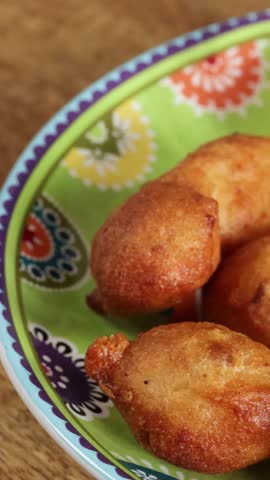 Cod fritters, close-up, on a plate