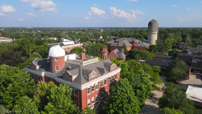 Sherzer Observatory in Eastern Michigan University, in Ypsilanti, Michigan, USA and the historic Ypsilanti Water Tower in the background