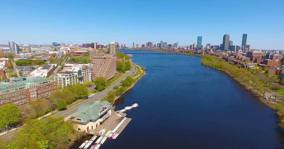 Aerial view of Cambridge on the left and Boston on the right connected by Harvard Bridge from Charles River, Boston, Massachusetts MA, USA. 