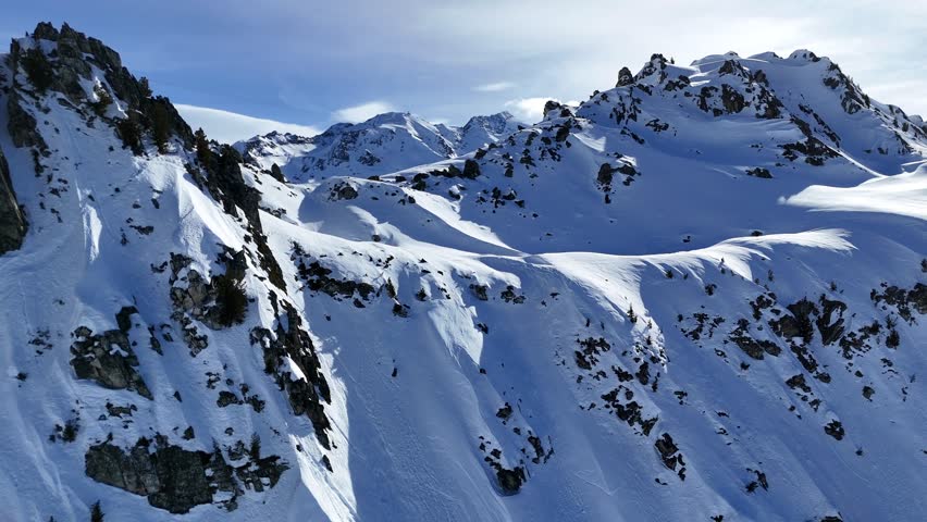 Snowy Mountain peaks aerial view Les Arcs France