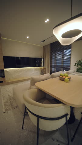Stylish and elegant minimalist home interior featuring clean lines, neutral colors, and warm ambient lighting, creating a cozy and modern atmosphere.