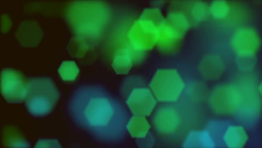 A futuristic animation featuring glowing green hexagon shapes moving dynamically on a black background. Perfect for tech-themed projects, digital presentations, and abstract designs
