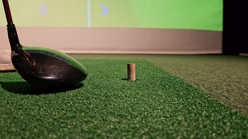 Screen golf. Putter and golf ball on the background of the screen - Powered by Shutterstock - Get 15% off with code: PIKWIZARD15
