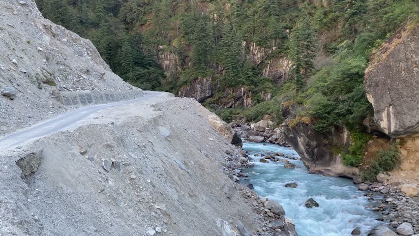 Gushing green waters of the Kali river on the way to Adi Kailash in Uttarakhand, India