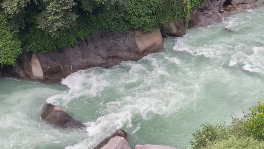 Gushing green waters of the Kali river on the way to Adi Kailash in Uttarakhand, India