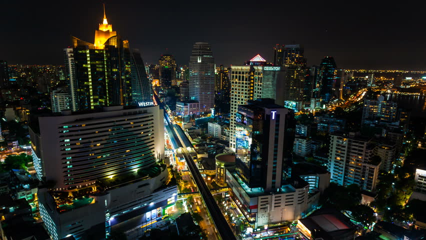 BANGKOK - 30 MARCH: Time lapse view of Bangkok skyline at night. Top view of 

