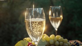 Beautiful View Of White Wine Poured Into Wineglass On Summer Terrace Of Nature - Powered by Shutterstock - Get 15% off with code: PIKWIZARD15