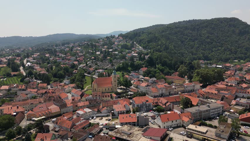 4K drone footage showing city of Samobor, Croatia. The video highlights its lush mountainous landscapes, historic churches, and majestic castles, offering a breathtaking aerial perspective.