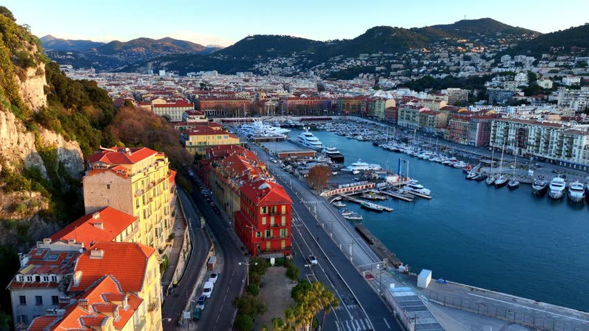 Harbour with luxury yachts in Nice, France. Aerial view of French Riviera, a French resort in Nice. Drone view of sunrise in Nice