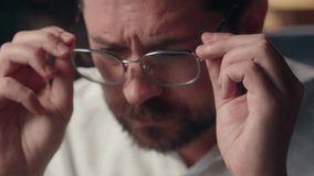 Caucasian worker male manager adult employer leader guy businessman agent man fixing eyeglasses in office health eyesight problem myopia business entrepreneur close up blurry vision laser correction - Powered by Shutterstock - Get 15% off with code: PIKWIZARD15