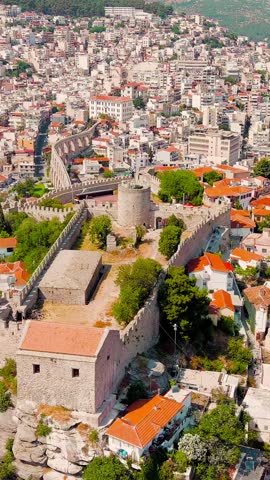 Vertical video. Kavala, Greece. Kavala Fortress. Historic city center. Aegean Sea. Summer, Aerial View, Point of interest. Rich colors