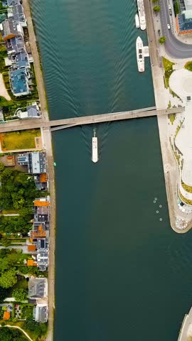 Vertical video. Namur, Belgium. Arrow at the confluence of the Sambre and Meuse rivers, Aerial View. Rich colors