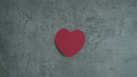 Heart-shaped sticky note stuck on the wall and then torn off, the concept of divorce, breakup and heartbreak. - Powered by Shutterstock - Get 15% off with code: PIKWIZARD15