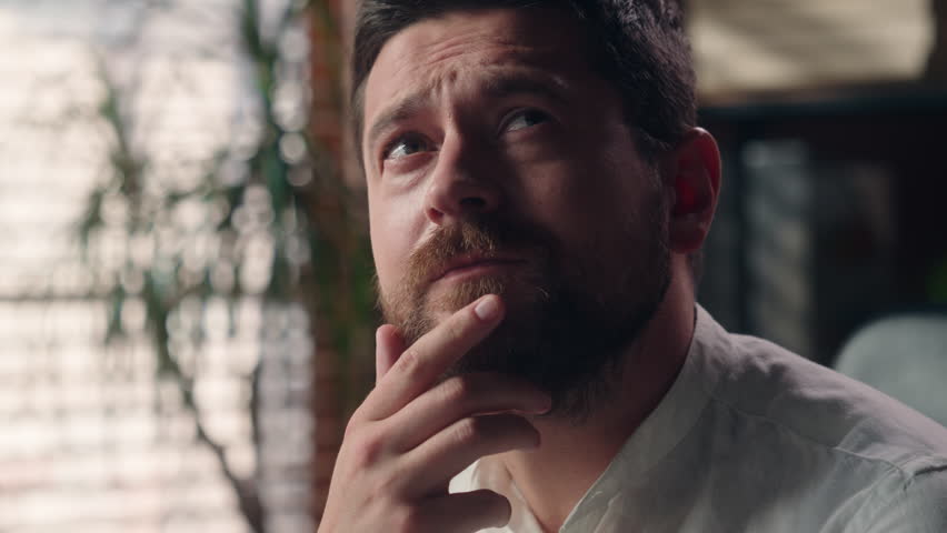 Puzzled thoughtful Caucasian guy man leader manager thinking employer male dreaming in office business trouble finance difficulty. Pensive middle-aged entrepreneur wondering businessman contemplating