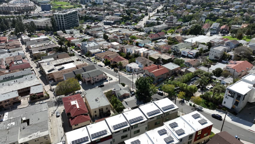 Los Angeles from Victor Heights Hills Aerial Shot Back Tilt Up in California USA