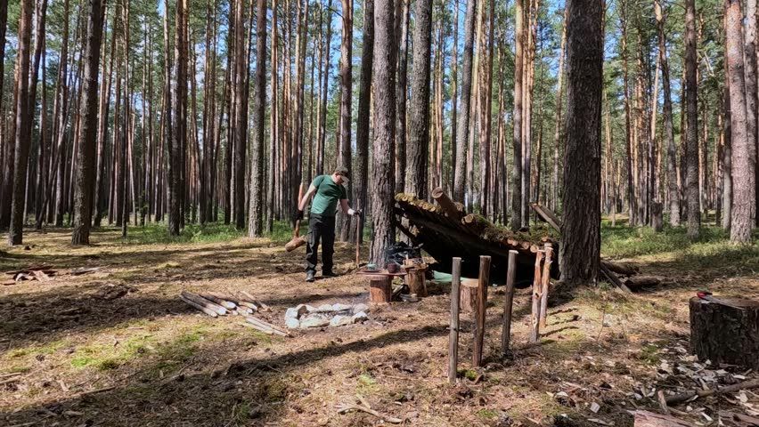 Man bushcrafts and survives in the forest