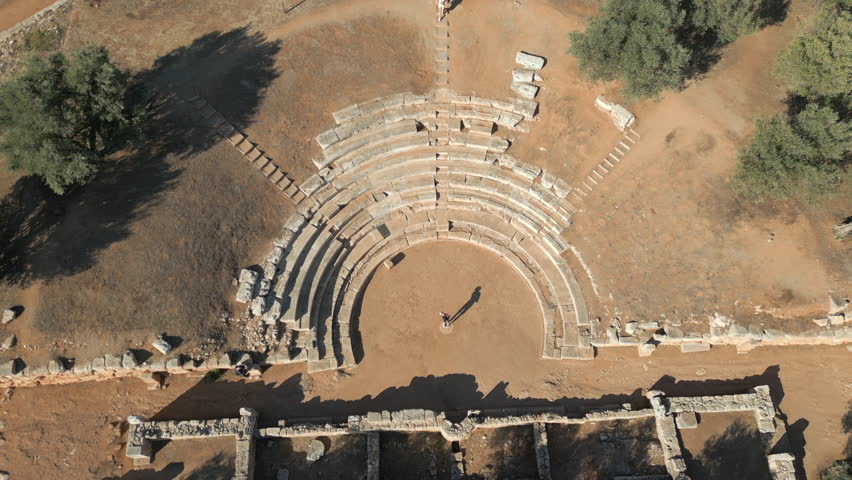 Tourists Walk Around Ancient Outdoor Theater Of Aptera On Greek Island Of Crete 4K 60FPS