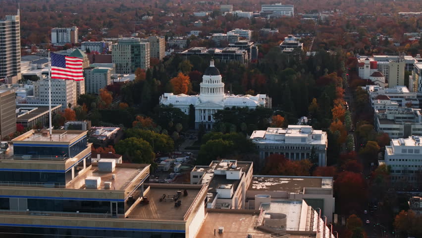 Drone Aerial of the California State Capitol Building in Sacramento, CA, during Golden Hour, Pull Back, 4K UHD