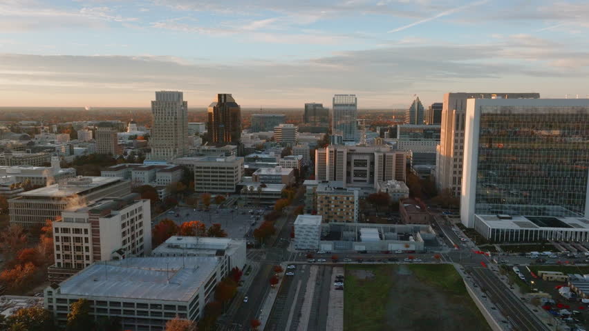 High Altitude Drone Aerial of Downtown Sacramento, CA Skyline during Golden Hour, Pan-Left, 4K UHD