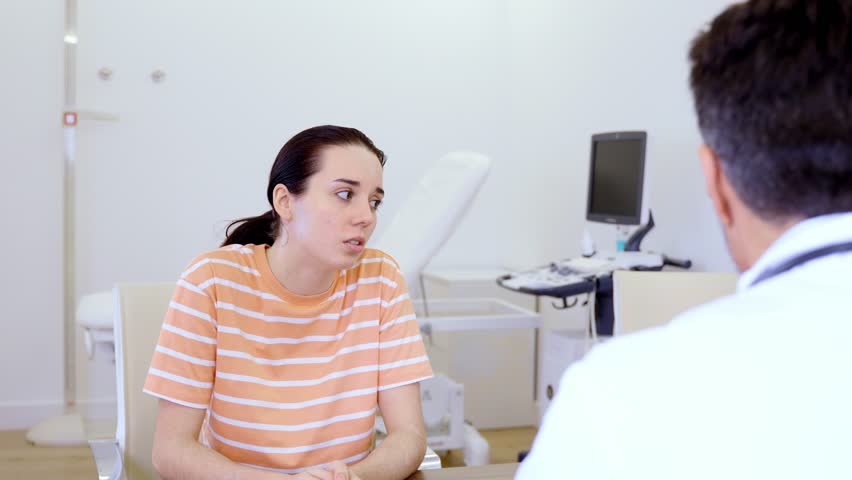 Medical consultation between doctor, nurse and patient, followed by the patient leaving the doctor's office
