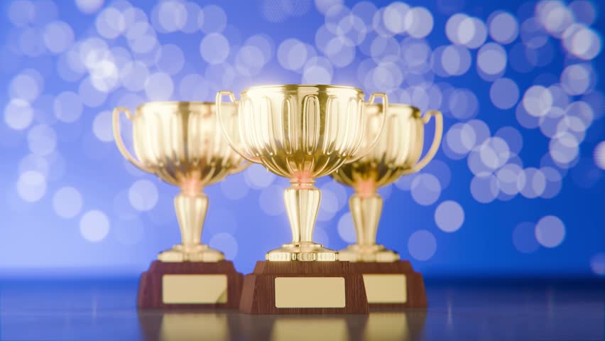 The concept of success in business. Victory. First place in a computer game. The winner's cup. The winner's award. Achievements. Rotate the camera. Award for outstanding achievements.