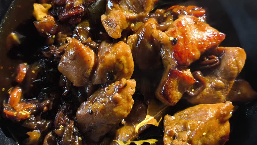 Stewed chopped pork with sauce in bowl, in door  Chiangmai  Thailand.