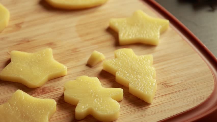  Raw Potatoes Cut into Festive Christmas Shapes