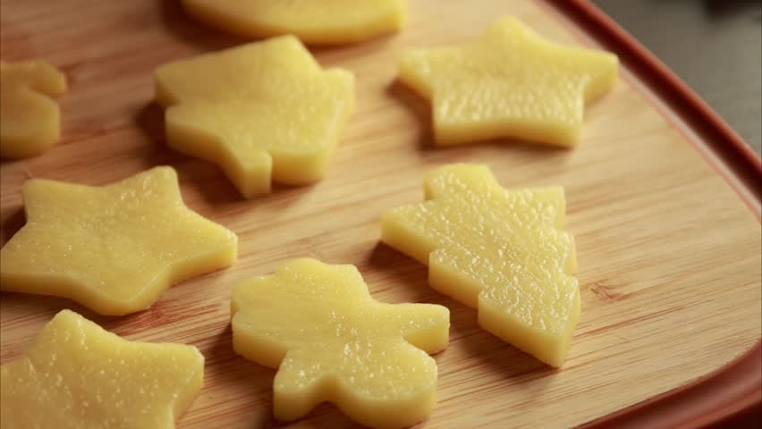  Raw Potatoes Cut into Festive Christmas Shapes