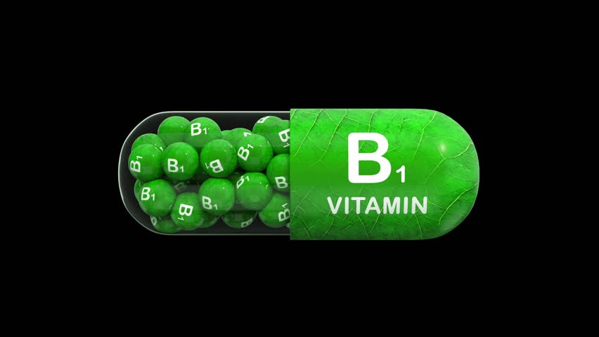 B1 capsule. Vitamin B1(thiamine) in green granule. Pills for preventing vitamin B1 deficiency. Essential vitamin for in energy metabolism and overall health. Isolated. Black background. 3D rendering