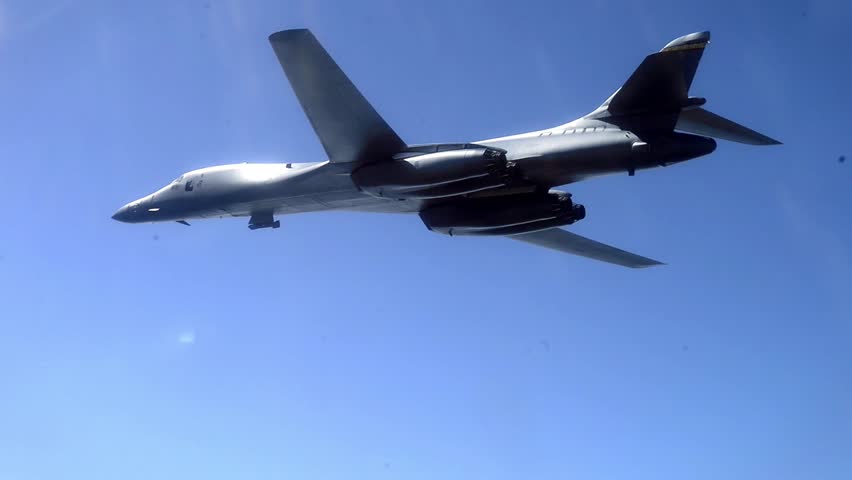 The bomber dropped several bombs on enemy territory.